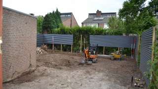 op juiste afschot brengen tuin, hoe leg ik bestrating ,wat te doen met zwarte grond, hovenier, tuinontwerp, tuin aanleggen, sierbestrating leggen Den Bosch Vught Eindhoven Waalwijk Best Ulvenhout Breda Waspik